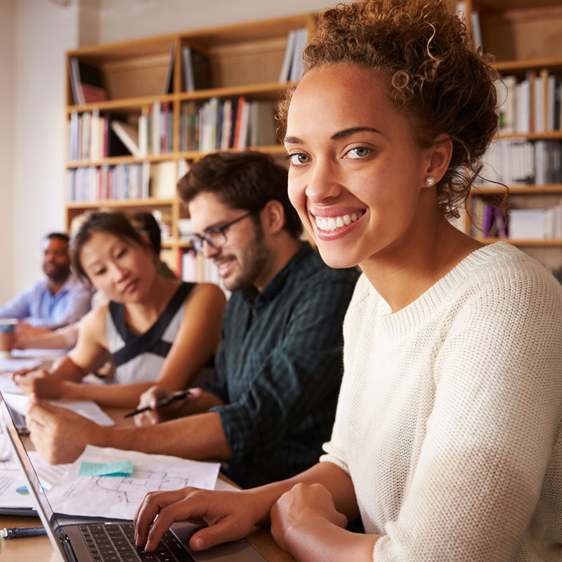 lady smiling in a library